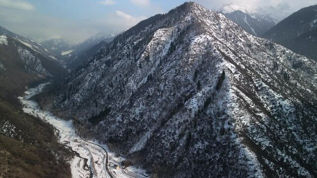 Talgar gorge. Tien Shan Mountains, Ile-Alatau Nature Park. Mountainous area with different vegetation. The view from the drone.