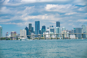 Miami Skyline: The iconic Miami skyline stretches along the coast, with modern skyscrapers piercing...