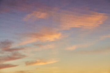 Pastel Clouds Reflected in Calm Water