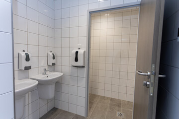 Explore a modern bathroom interior with stylish sinks and various amenities for comfort