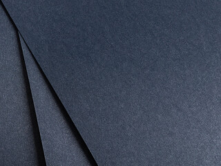 Elegant blue paper texture with a rich grainy finish, premium designer material for luxury stationery. Minimalistic and artistic backdrop with a modern chic style..