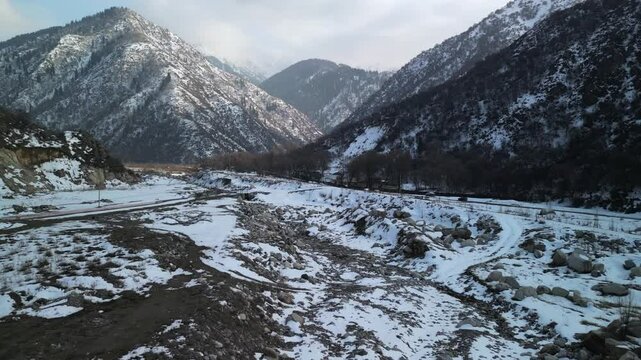 The Talgar River. Talgar gorge. Tien Shan Mountains, Ile-Alatau Nature Park. Mountainous area with different vegetation. The view from the drone.