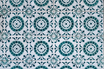 Close-up of traditional azulejo tiles on a historic facade in downtown Lisbon