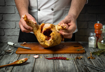 Mastering the art of cooking delicious dishes from fresh ingredients and chicken in the kitchen. Restaurant or hotel service concept