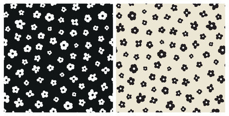 Set of cute simple retro flower heads seamless repeat pattern. Random placed, vector bloomy botany aop, all over surface print set in black and white.