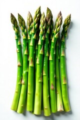 Tender, vibrant green asparagus spears, elegantly arranged on a stark white backdrop , closeup, clean