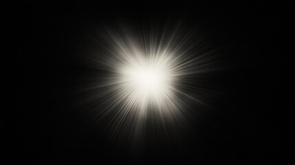 Obraz premium Bright white light burst on black background.
