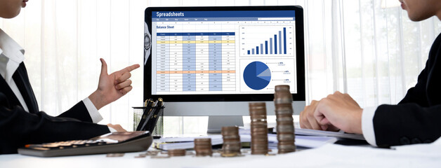Spreadsheet document information financial startup concept. data and graphs in spreadsheet...
