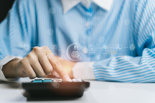 Human Hand Using Calculator with AI Symbols and Technology in Background for Stock Photo, Business concept