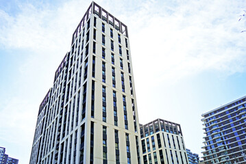 Obraz premium Contemporary developments in the capital of Serbia: buildings photographed from the bottom up in the Belgrade Waterfront. A walk through the new district of the city: an immersive look at housing