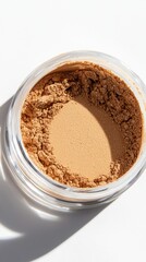 Enhanced makeup application with translucent powder foundation in jar bright light closeup view emphasizing fine texture and lightweight feel