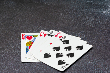 A powerful poker hand featuring four eights (four-of-a-kind) with a King of Hearts as the kicker. A symbol of luck, strategy, and high-stakes gambling, perfect for casino and card game themes.