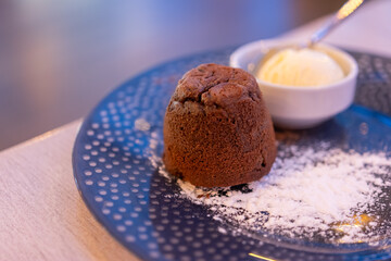 Lava Cake with Ice Cream on a Blue Plate