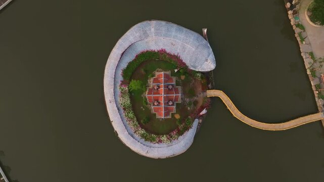 Aerial scene of temple architecture shining under golden dawn. Aerial drone video