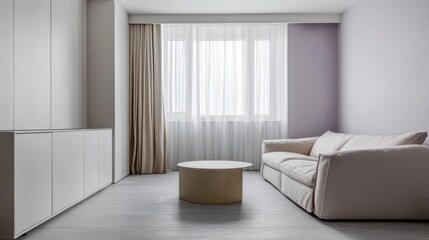 A modern, minimalist studio apartment with light grey floors and soft lavender walls
