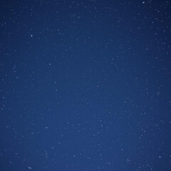 Obraz premium Stellar Skies: A Celestial Dance of Stars and Darkness