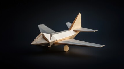A paper airplane with a pointed nose and a tail fin.