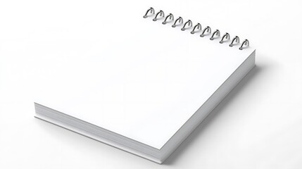 A blank spiral notebook resting on a clean surface, ready for notes or drawings.