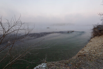 a winter foggy sunrise along the Ticino riverbank, Besate, Milano province