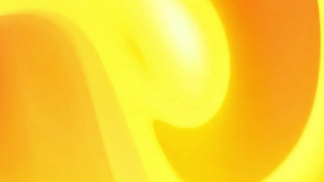 Abstract blurred gradient background in warm yellow and orange, fluid dynamic energy with smooth color transitions