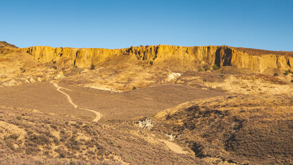 Stunning landscape scenery bannockburn sluicings new zealand clay cliffs rocks in sunrise light