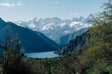 Majestic mountains and serene lakes reveal the breathtaking beauty of Kyrgyzstan's natural landscape