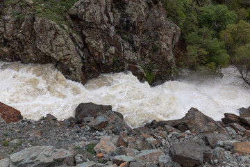 The Arpa River in Vayots Dzor, Armenia, swells with powerful floodwaters from the Kechut Reservoir after heavy spring rainfall, rushing through the Arpa Gorge.