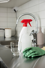 cleaning products in a kitchen