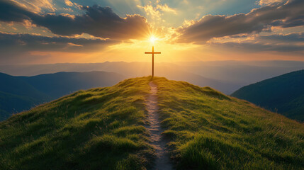 Obraz premium Parth Leading to Jesus Christ Cross on Hill Illuminated by Sun Rays