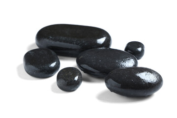 Composition with wet spa stones isolated on white background