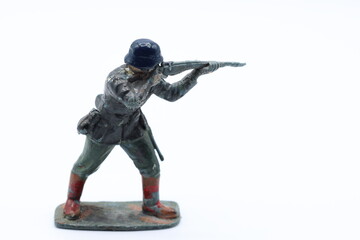 War with miniature plastic toy soldiers.  German WW2 uniform.
