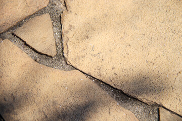 detail of a broken sidewalk in Rio de Janeiro.
