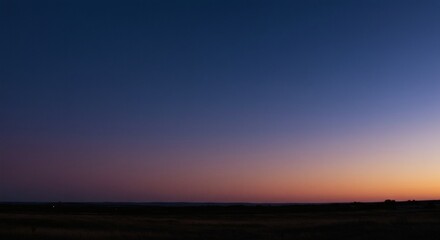 Fototapeta premium Serene Twilight Landscape Pastel Sunset Sky Over Dark Field