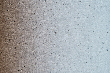Fototapeta premium Textured surface with a subtle color gradient showcasing a raw and natural aesthetic Great for backgrounds and textures