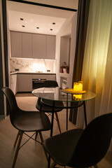 Candles Dinner Table Apartment: Cozy Evening Ambiance, Modern Kitchen View