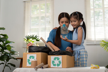 Recycling and Childhood Learning. A mother and daughter explore recycling practices, creating memories while sorting waste.