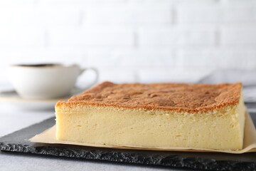Tasty Japanese Castella sponge cake served on light table, closeup. Space for text
