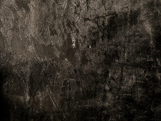 Obraz premium Black dark grunge concrete wall background with aged texture. Abstract wall texture for design, editing, overlays, and digital projects.