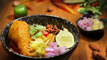 famous noodle food concept Delicious Khao Soi with chicken, noodles, lime, and fresh toppings