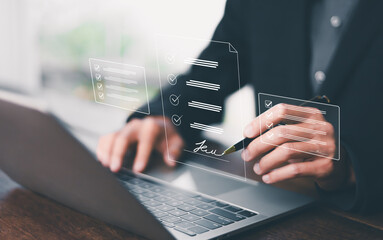 Electronic signature Businessman signs electronic document on digital document on page Electronic...