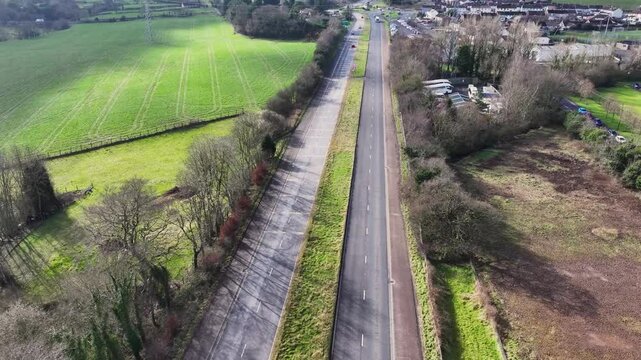 Aerial video of A8 Larne road, Ballymena Belfast road, Millbrook Larne Co Antrim Northern Ireland 14-03-25