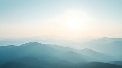 Fototapeta premium Misty mountain range at sunrise.