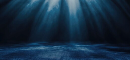 Obraz premium A beam of light shines into the dark stage background