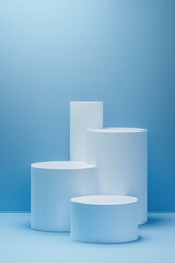 Four white cylinders on a light blue background