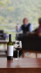 Wine tasting experience with sommelier enjoying beverage in background