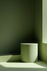 Minimalist, sage green cylinder podium in a sunlit corner display