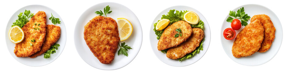 Crispy golden brown breaded fried chicken breasts served on a white plate with fresh lemon wedges and parsley garnish
