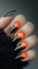 Nail Art Featuring Sunset Sky and Mountains Design on Black Background Creative Manicure Concept.