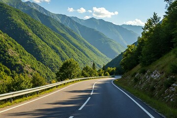 Fototapeta premium Winding Road Through Lush Mountain Scenery