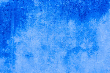 Abstract grunge background with copy space. Classic blue concrete wall. Texture for layout and graphic design.